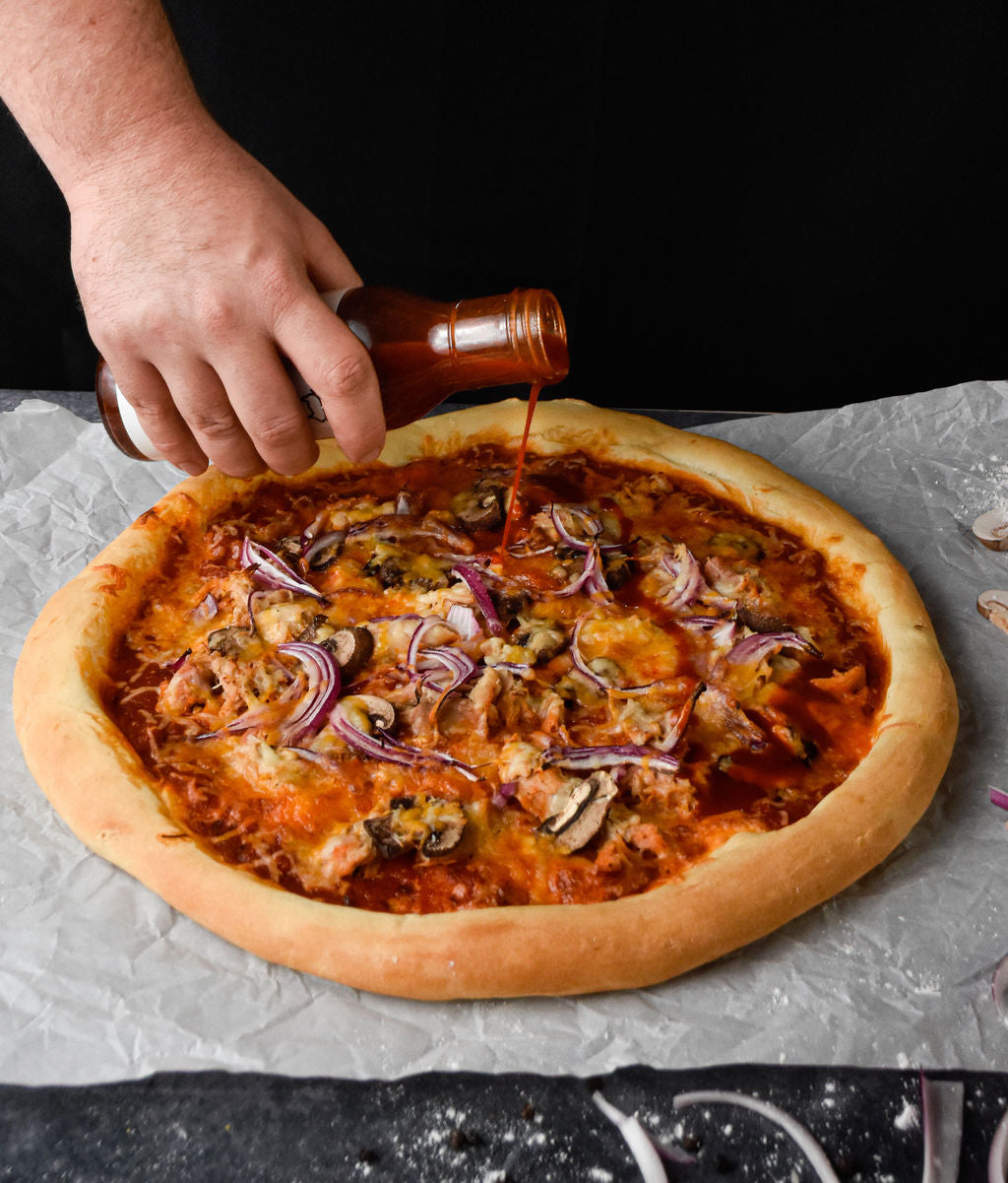 BBQ Chicken Pizza made with Piedmont BBQ Co Buttermilk Brined Pulled Chicken - Pickup at Our Kitchen