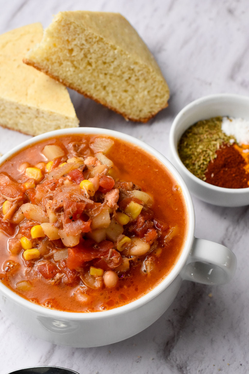 Piedmont BBQ Co Brunswick Stew in a bowl with cornbread - Pickup at Our Kitchen 