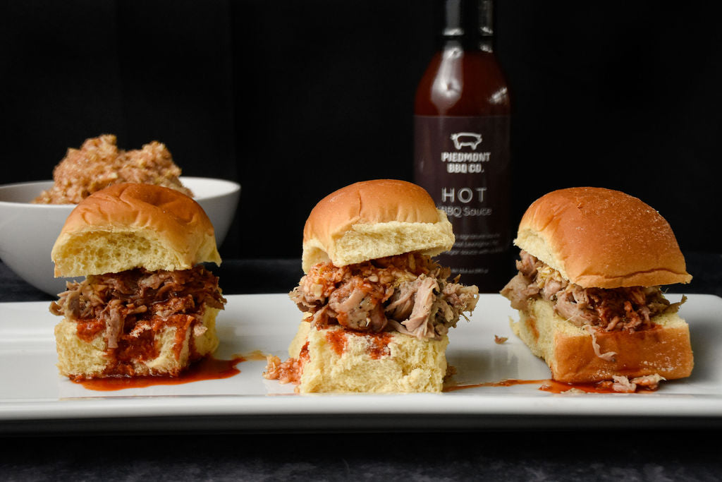 Three Sliders made with Piedmont BBQ Co Carolina Pulled Pork and Hot BBQ Sauce 